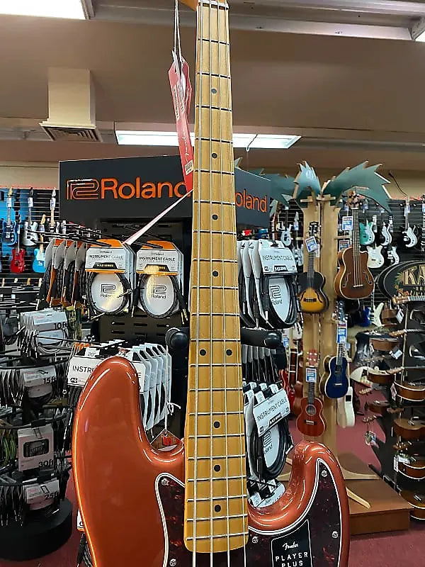 FENDER PLAYER PLUS JAZZ BASS-AGED CANDY APPLE RED